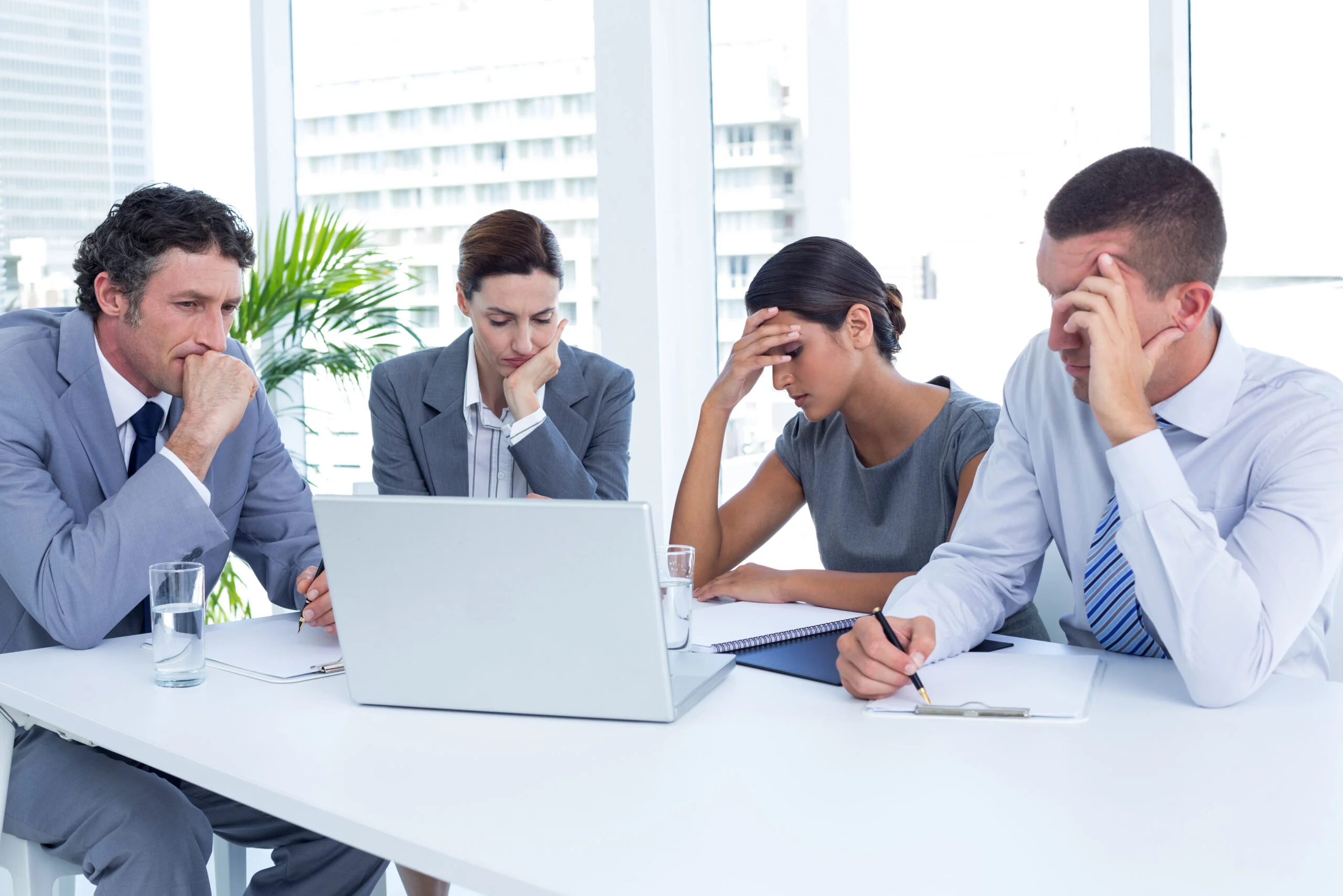 Indian professionals discussing in a global corporate environment