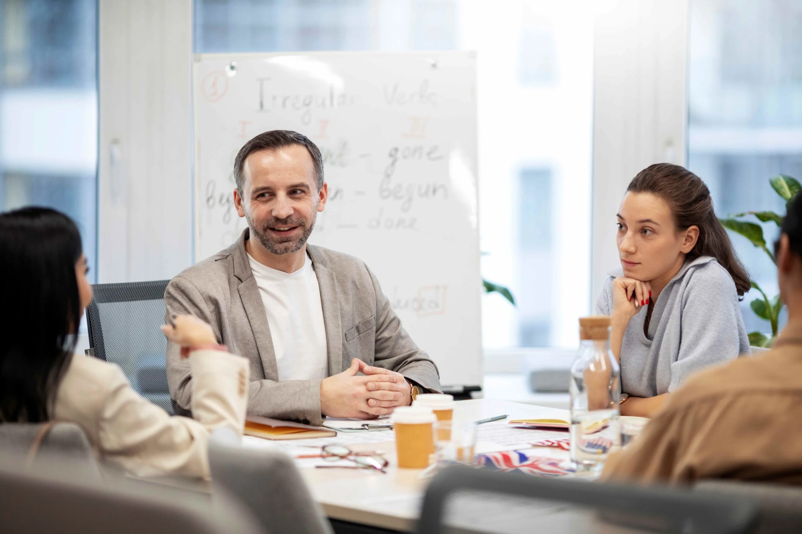 Working professional attending structured English improvement sessions