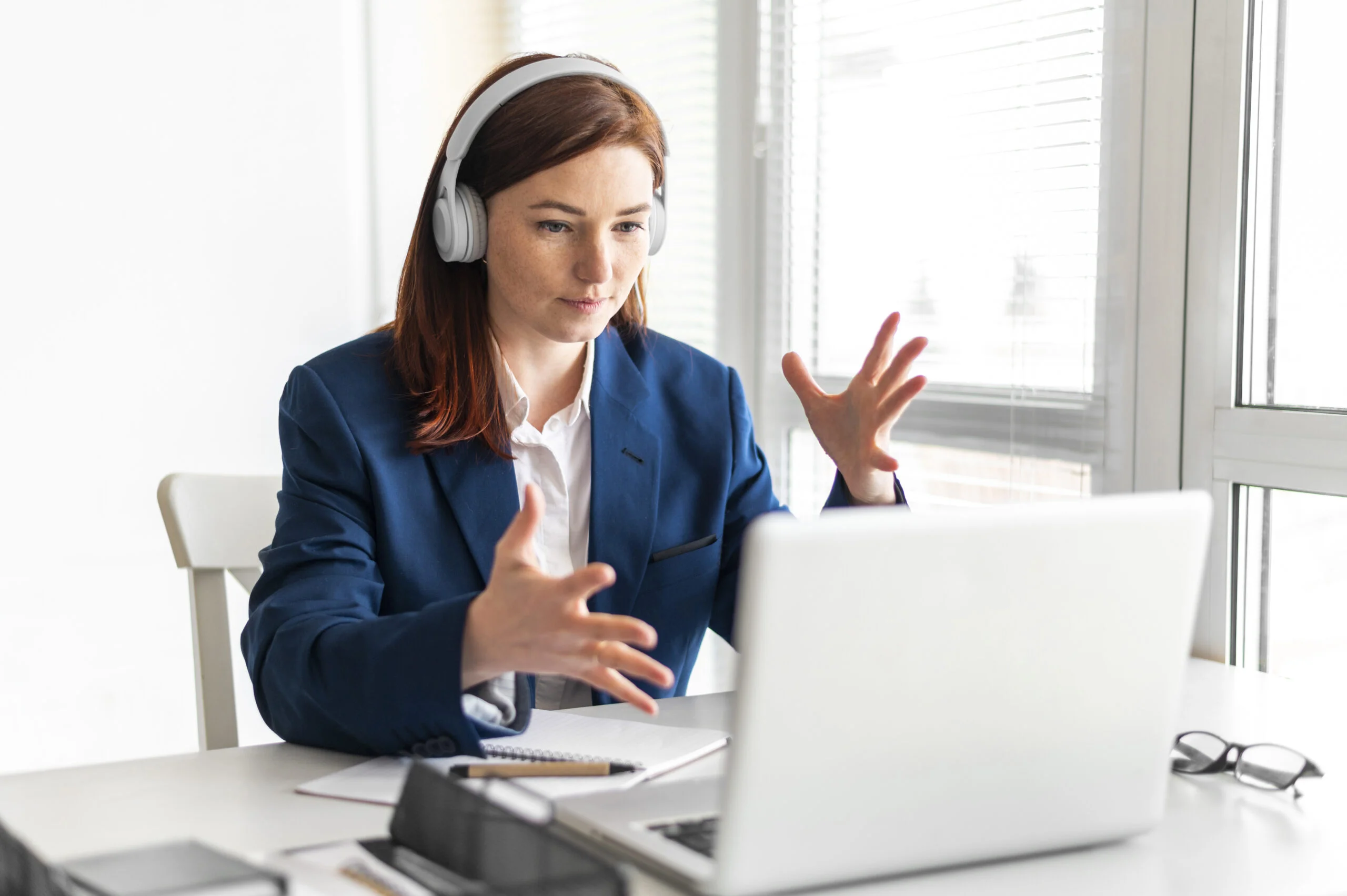 Professional woman engaging in an online English course video call